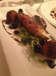 Prosciutto wrapped endive with croquettes and balsamic glaze.